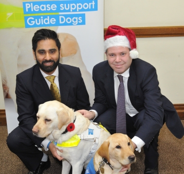 Edward meeting Guide Dogs supporters and the trainee guide dog pups