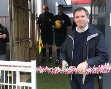 Edward cuts the ribbon at Anstey Nomads FC ground